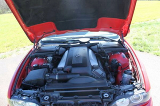 Illustration for article titled For $9,900, This 1999 BMW 540i Lets You Stick It To The Man